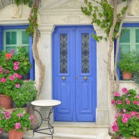 stockvault-door-with-flower-and-windows-in-tinos-island-of-greece240435
